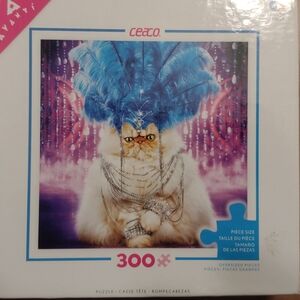 Cat Puzzle with Blue Feathers